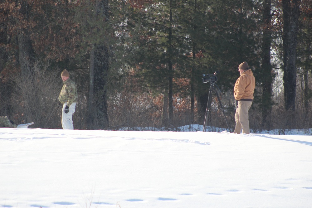 Cold-Weather Operations Course class 22-03 students build Arctic tents on Fort McCoy's South Post