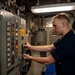 USS Carl Vinson (CVN 70) Sailor Operates a Weapons Elevator