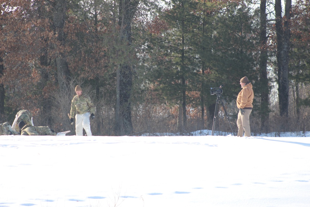 Cold-Weather Operations Course class 22-03 students build Arctic tents on Fort McCoy's South Post