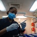 USS Carl Vinson (CVN 70) Sailors Operate In Dental Department