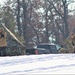 Cold-Weather Operations Course class 22-03 students build Arctic tents on Fort McCoy's South Post