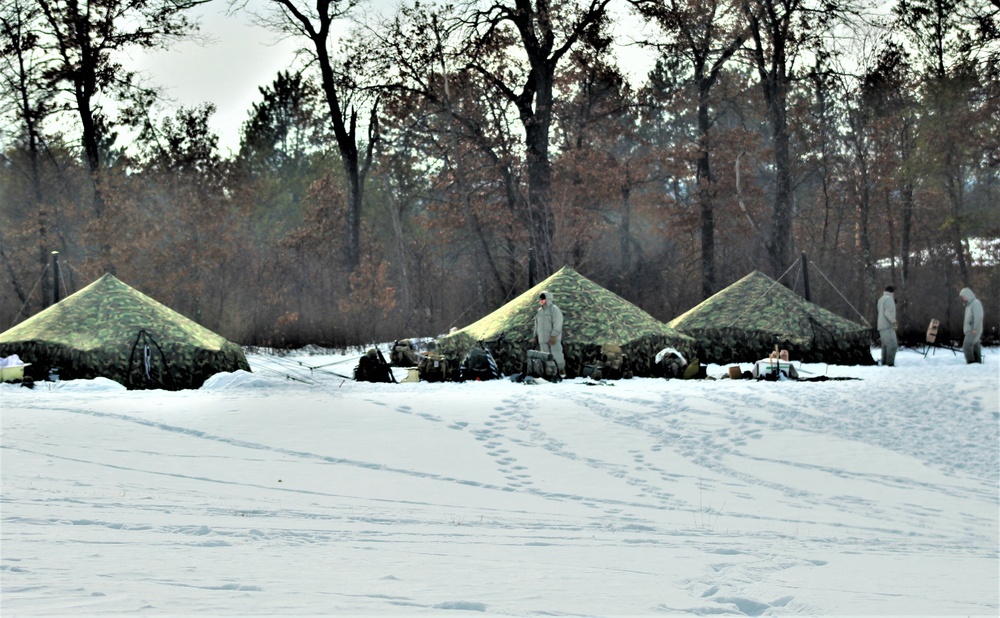 Cold-Weather Operations Course class 22-03 students build Arctic tents on Fort McCoy's South Post