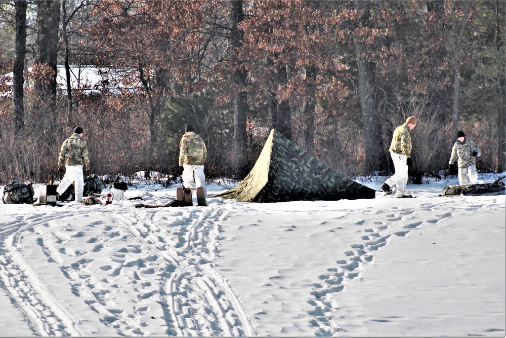 Cold-Weather Operations Course class 22-03 students build Arctic tents on Fort McCoy's South Post