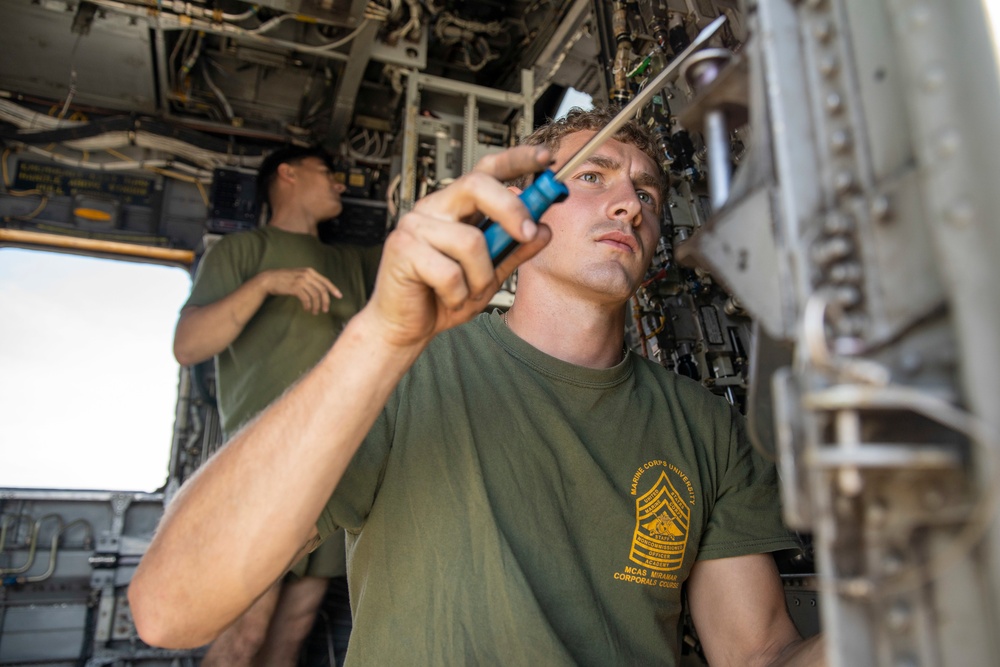 CH-53E deep cleaning aboard USS Portland