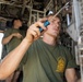 CH-53E deep cleaning aboard USS Portland