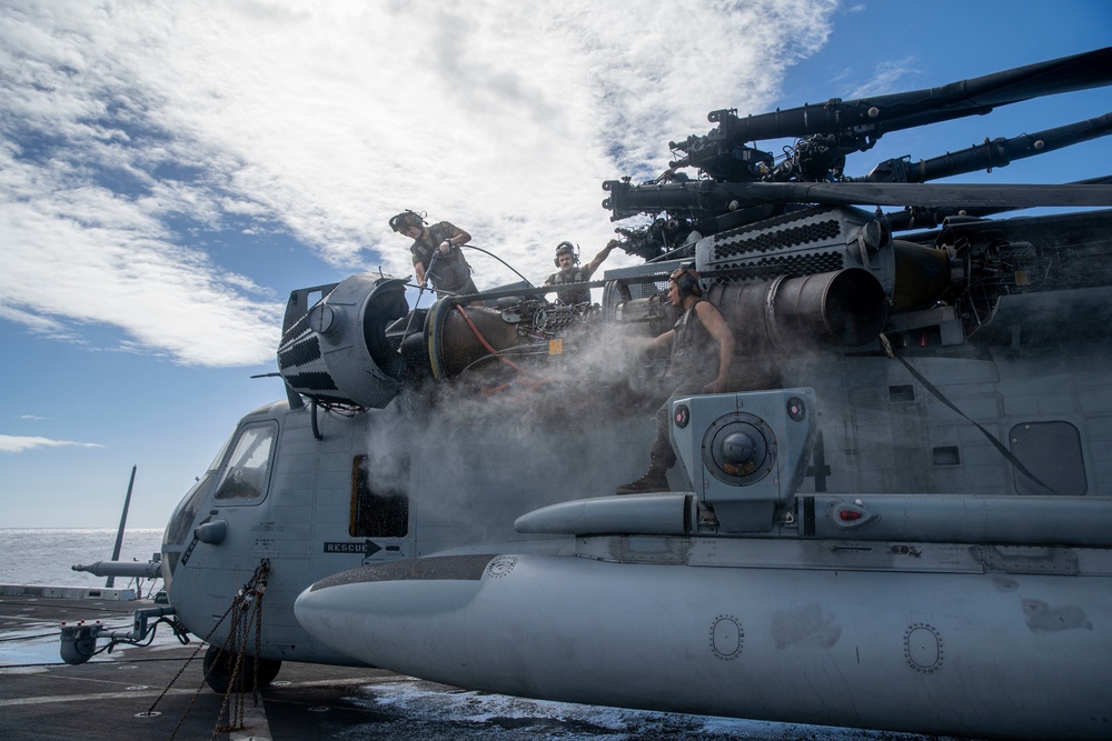 CH-53E deep cleaning aboard USS Portland