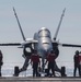 Sailors Chain Down Aircraft During Drill