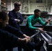 Abraham Lincoln Sailors calibrate tools