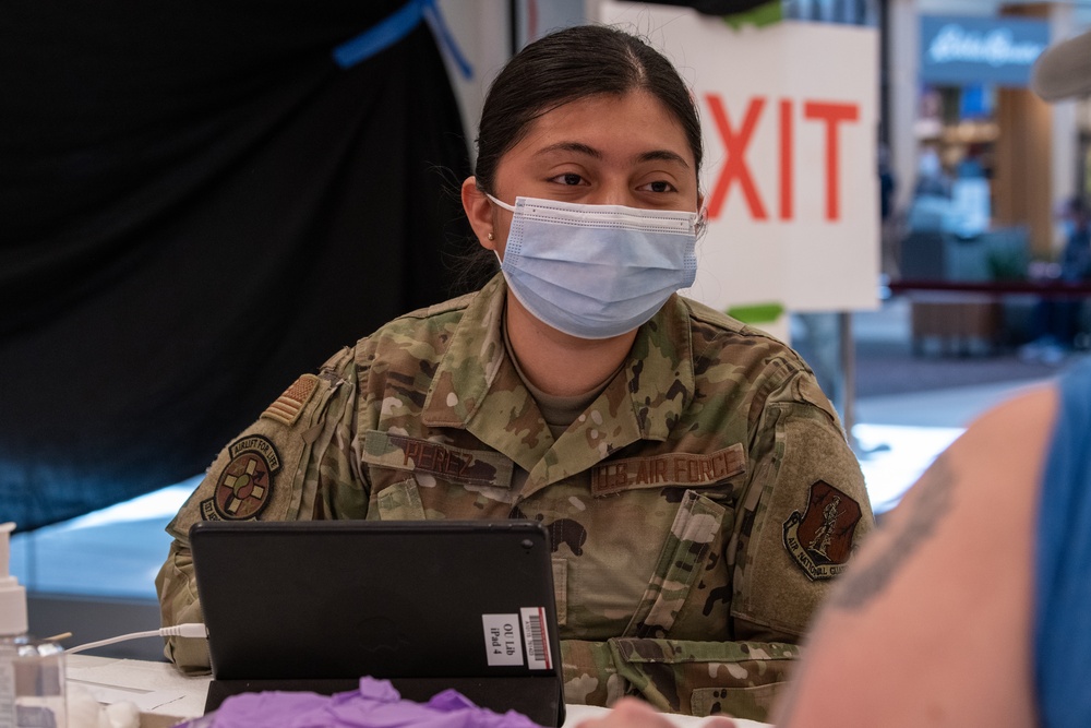 Army and Air National Guardsmen volunteer to administer COVID-19 vaccinations