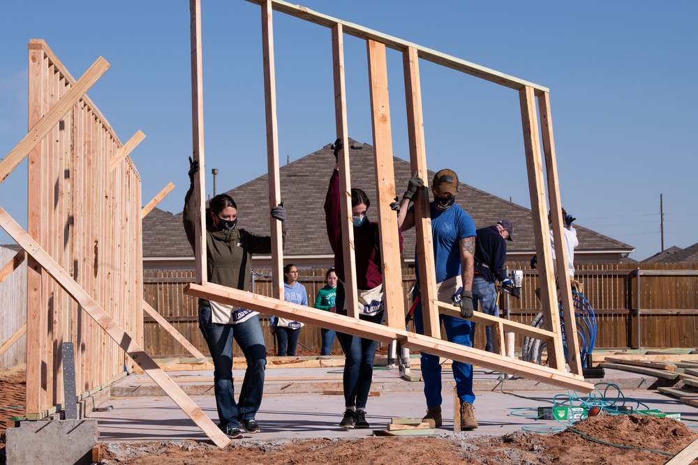 137th SOW Recruiting team joins Habitat for Humanity build