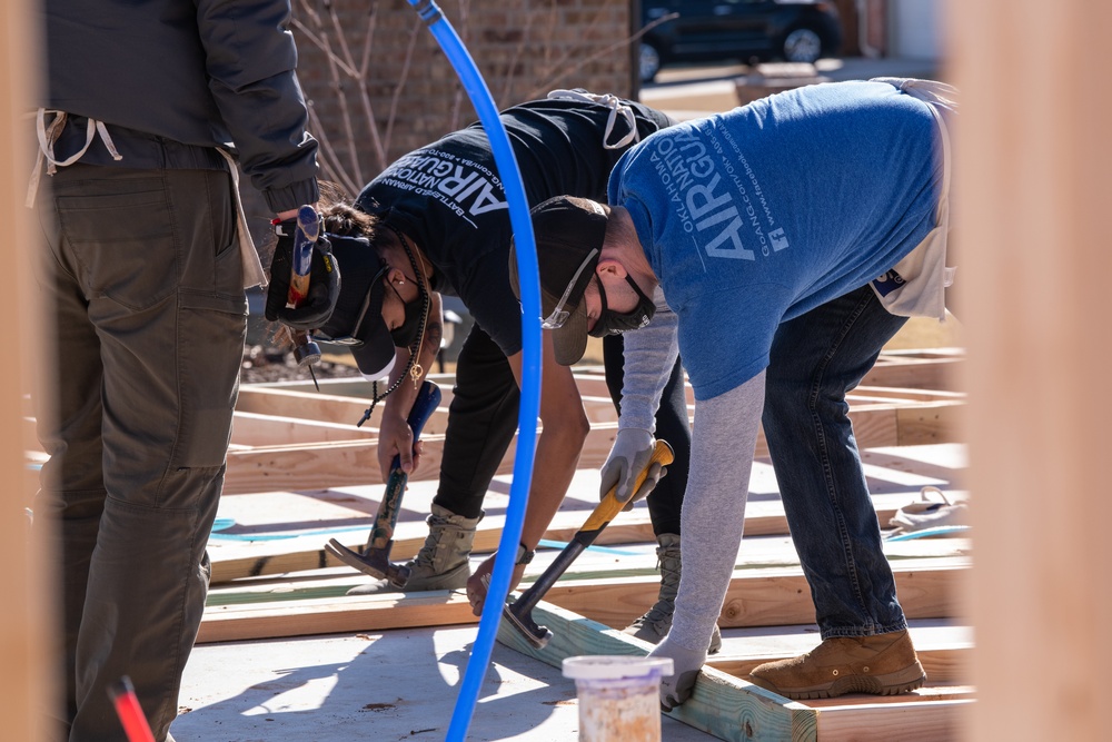137th SOW Recruiting team joins Habitat for Humanity build