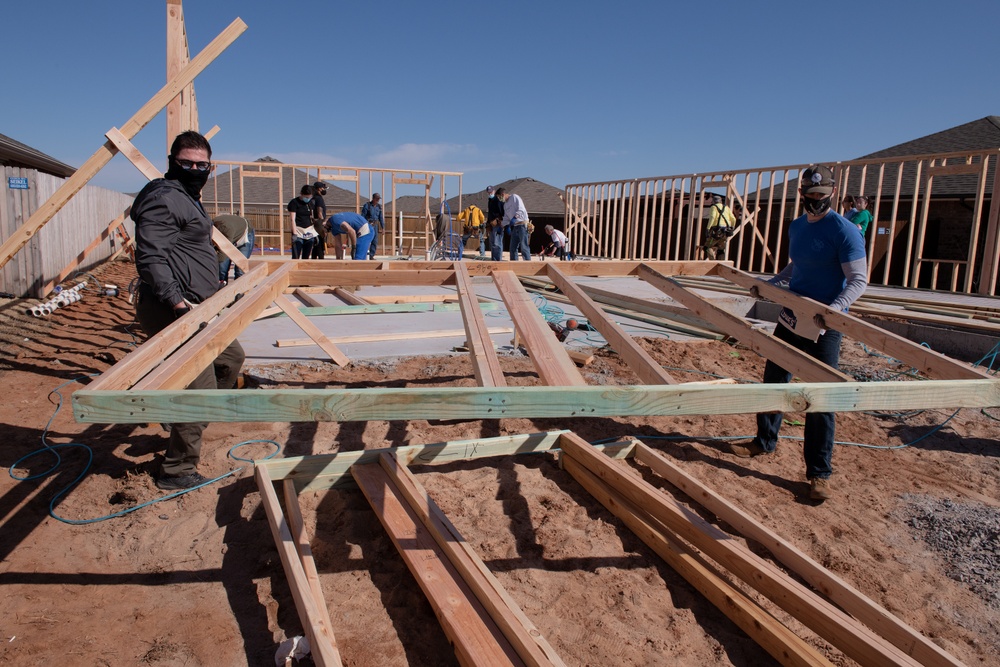 137th SOW Recruiting team joins Habitat for Humanity build