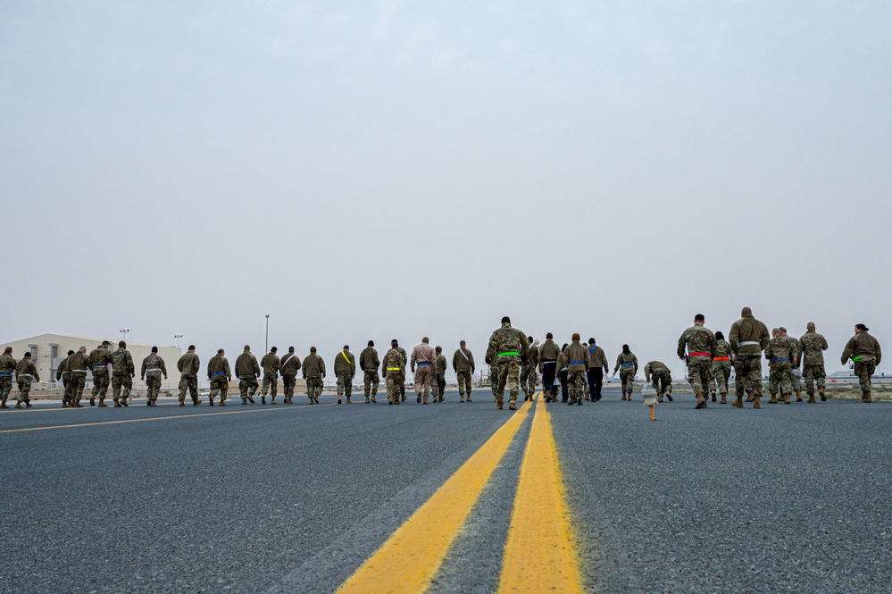Sweeping the flight line: 386th Expeditionary Maintenance Squadron's weekly FOD walk
