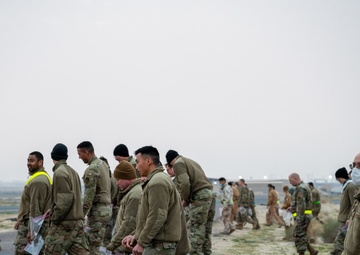 Sweeping the flight line: 386th Expeditionary Maintenance Squadron's weekly FOD walk