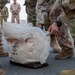 Sweeping the flight line: 386th Expeditionary Maintenance Squadron's weekly FOD walk