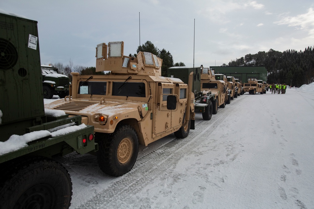 Marines prepare vehicles for a convoy movement prior to Exercise Cold Response 2022