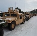 Marines prepare vehicles for a convoy movement prior to Exercise Cold Response 2022