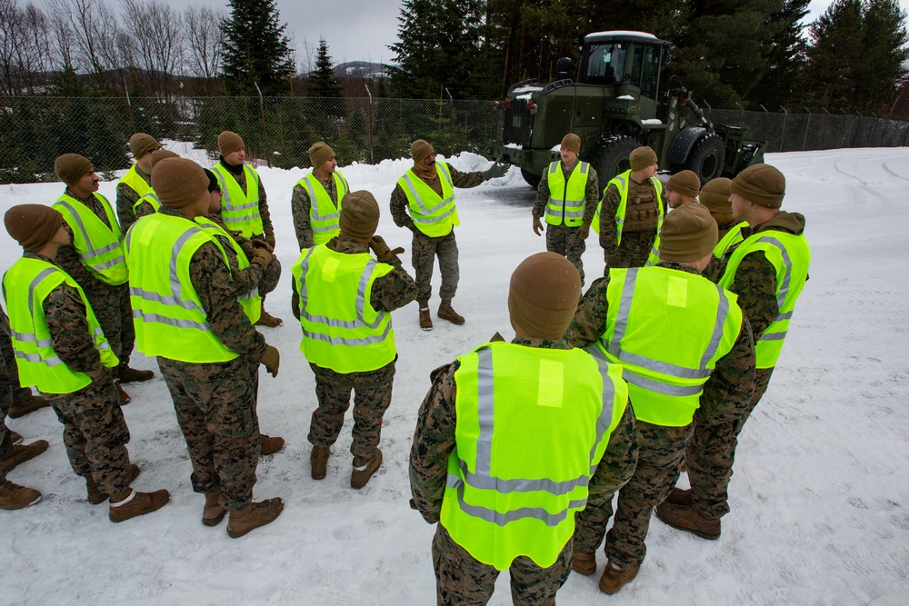 Marines prepare vehicles for a convoy movement prior to Exercise Cold Response 2022