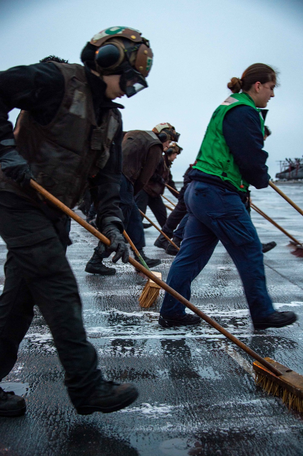 USS Carl Vinson (CVN 70) Sailors Clean The Flight Deck