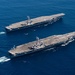 USS Carl Vinson (CVN 70) and USS Nimitz (CVN 68) transit the Pacific Ocean