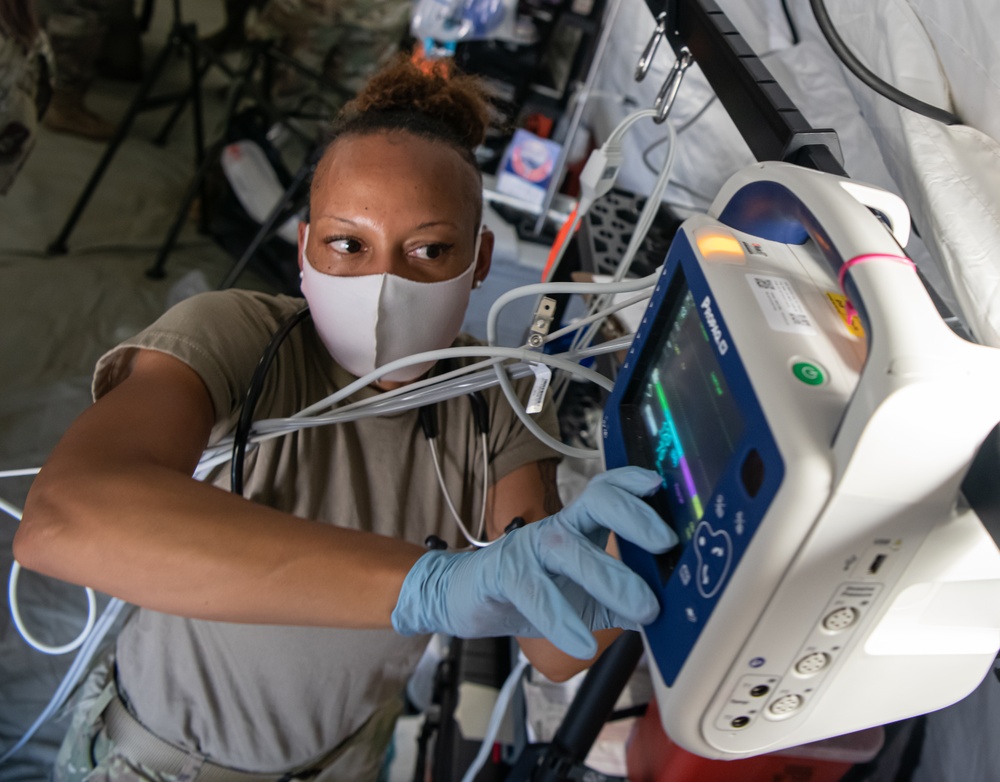 Expeditionary medical team treats simulated med-evac patients for Cope North 22