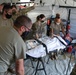 Expeditionary medical team treats simulated med-evac patients for Cope North 22