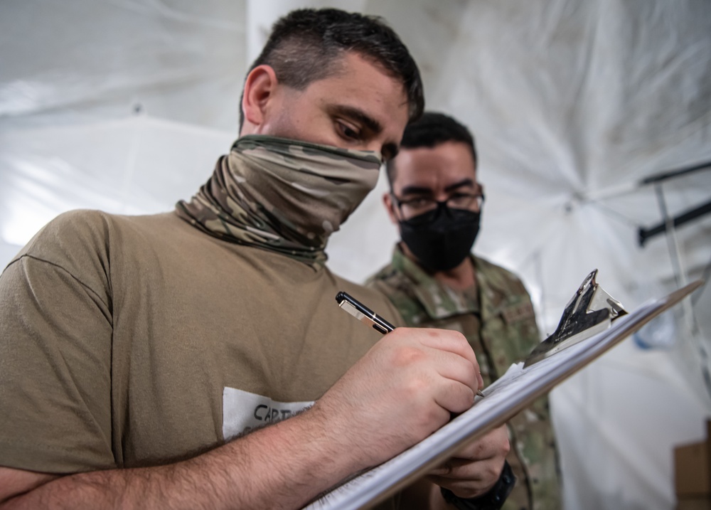 Expeditionary medical team treats simulated med-evac patients for Cope North 22