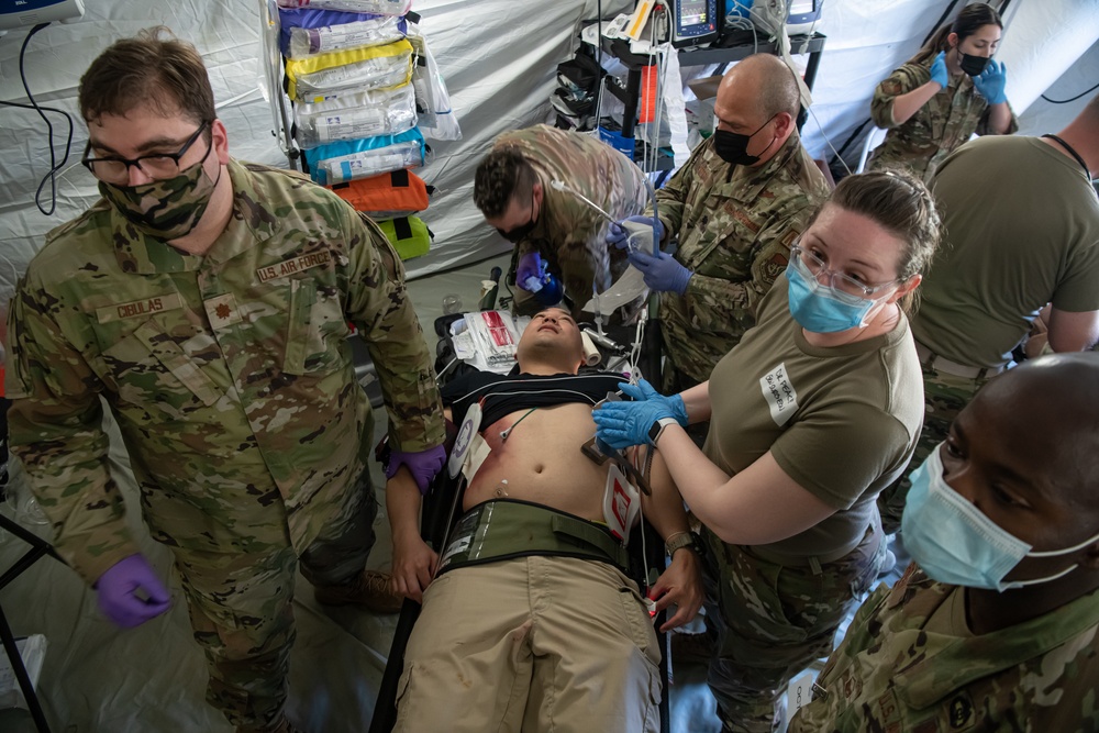 Expeditionary medical team treats simulated med-evac patients for Cope North 22