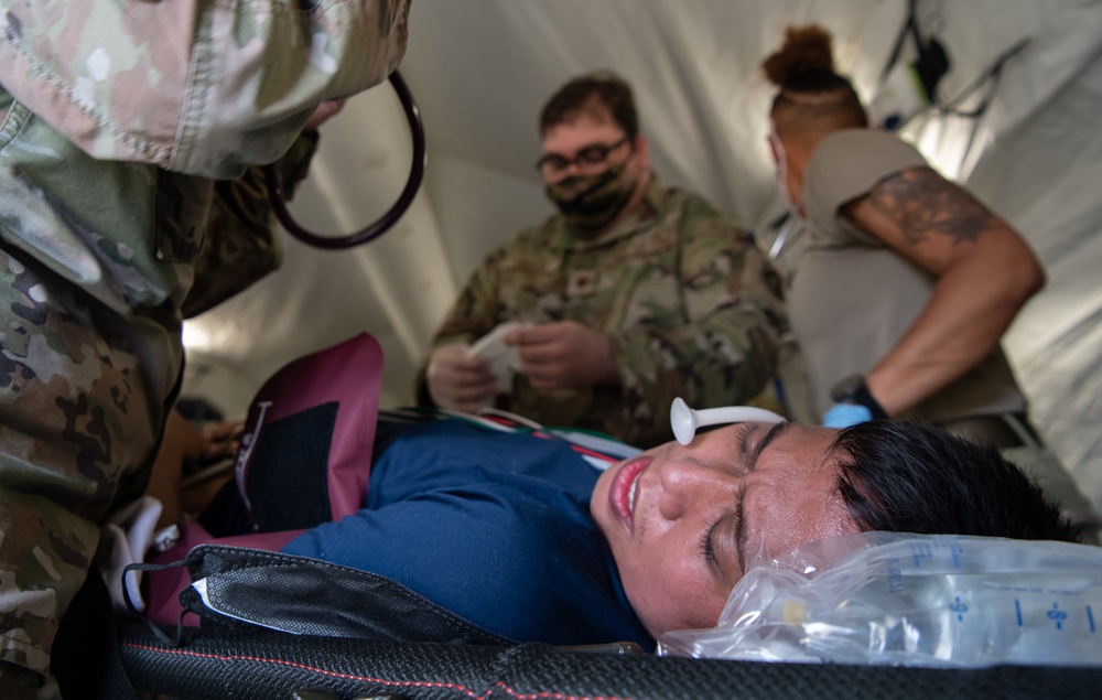 Expeditionary medical team treats simulated med-evac patients for Cope North 22