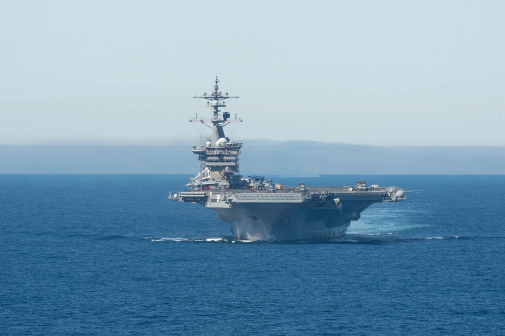 USS Carl Vinson Steams Alongside USS Nimitz