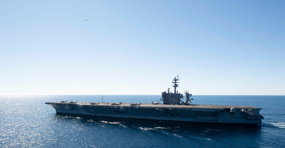 USS Carl Vinson Steams Alongside USS Nimitz