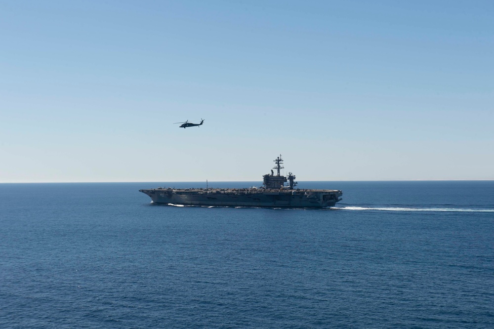 USS Carl Vinson Steams Alongside USS Nimitz