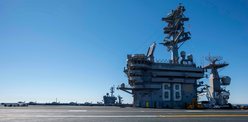 USS Carl Vinson Steams Alongside USS Nimitz