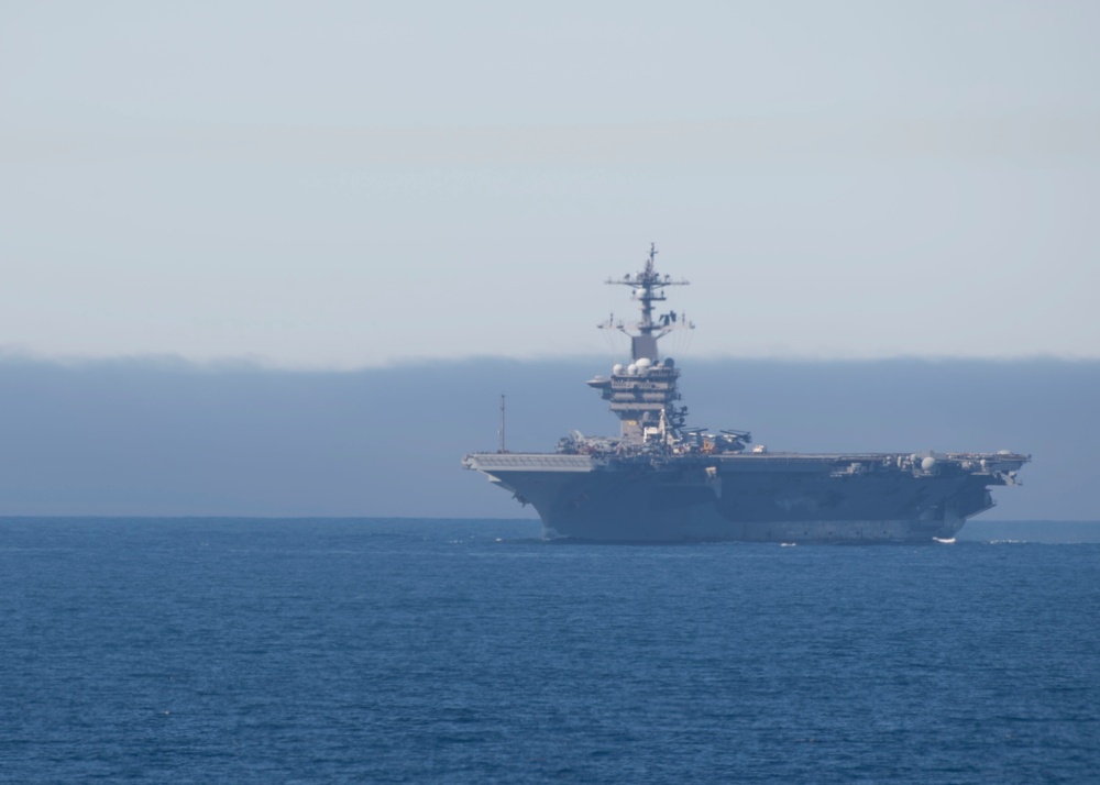 USS Carl Vinson Steams Alongside USS Nimitz