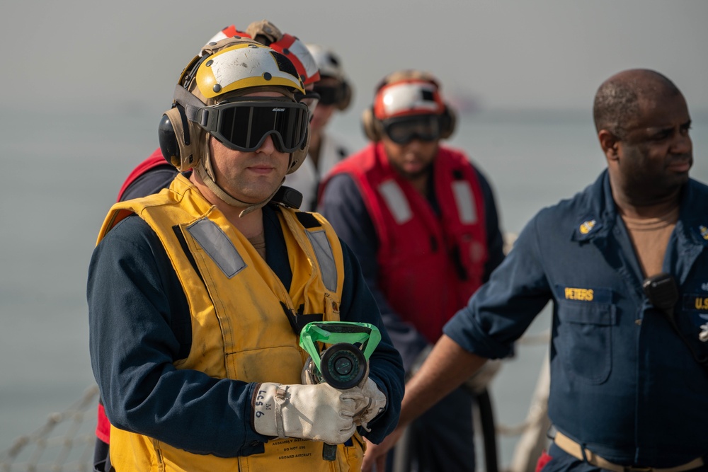 USS Jackson (LCS 6) Sailor Conducts Aviation Firefighting Drill