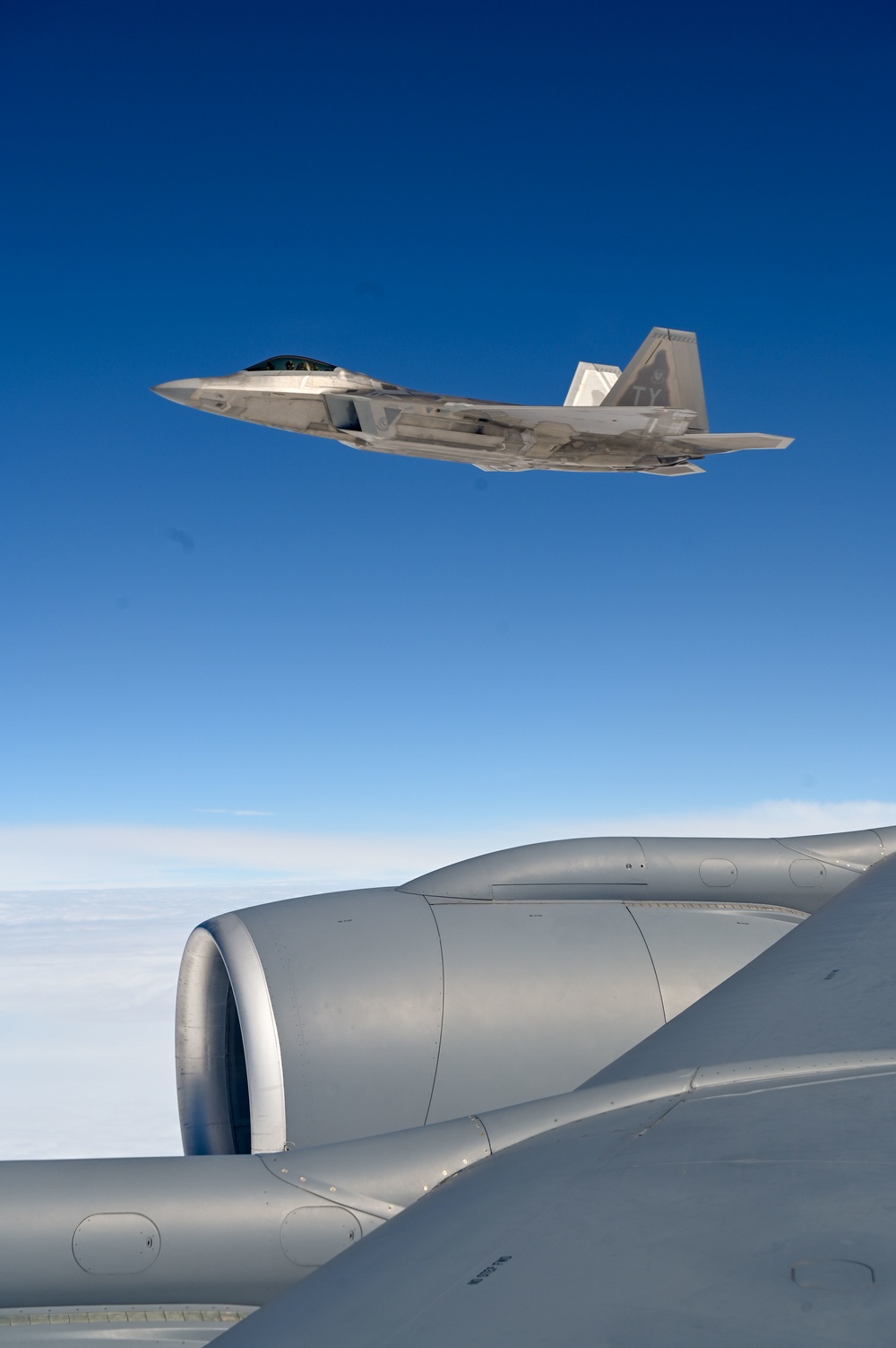 Eight F-22 Raptors refuel with Okies