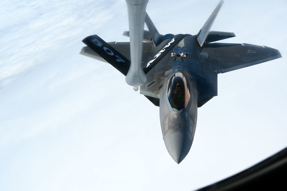 Eight F-22 Raptors refuel with Okies