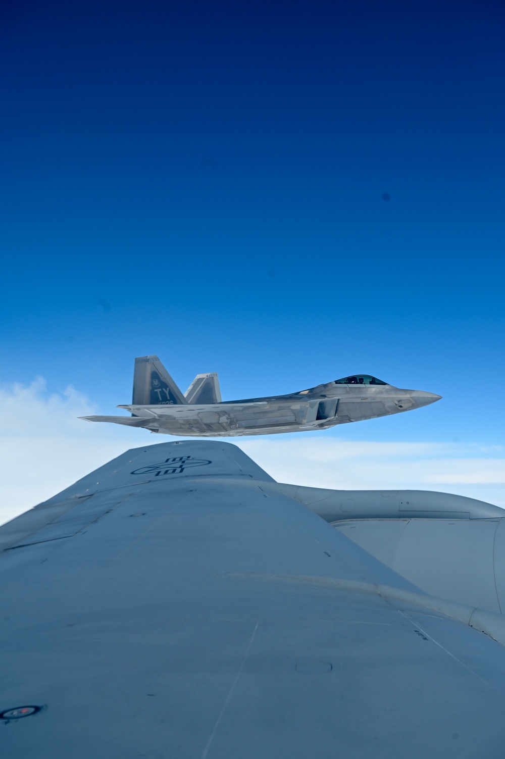 Eight F-22 Raptors refuel with Okies