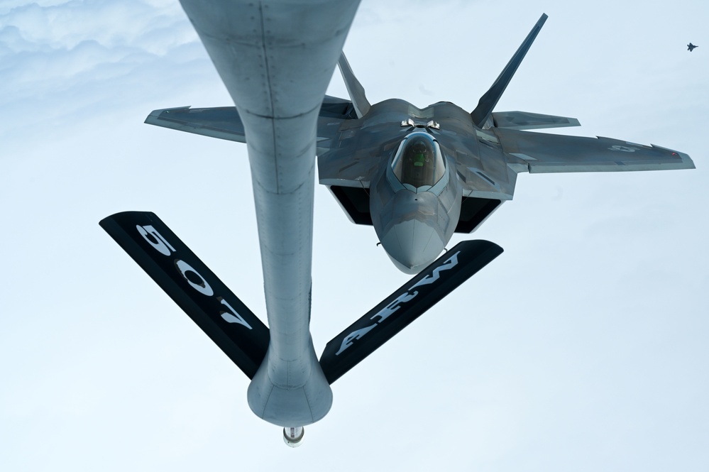 Eight F-22 Raptors refuel with the Okies