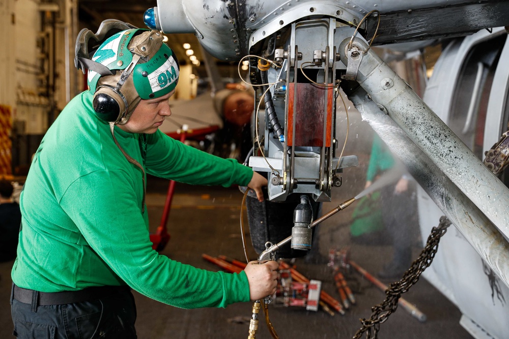 Abraham Lincoln Sailors conduct aircraft maintenance