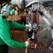 Abraham Lincoln Sailors conduct aircraft maintenance