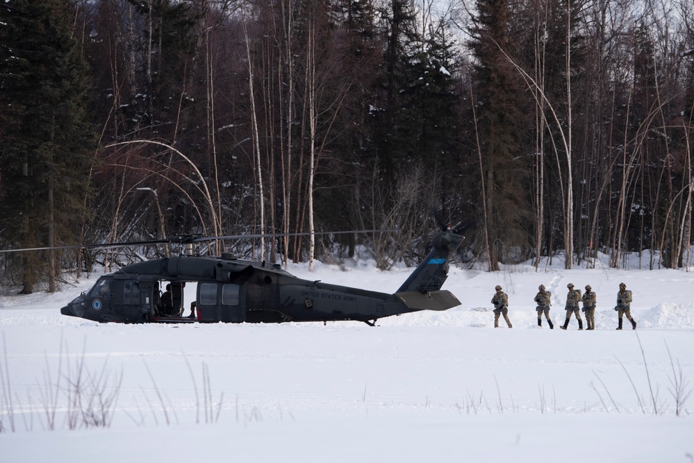 Special warfare Airmen, Army aviators conduct joint airborne training at JBER