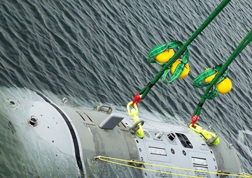 NUWC Division Newport, PEO team christen Snakehead UUV at Narragansett Bay Test Facility