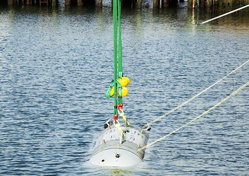 NUWC Division Newport, PEO team christen Snakehead UUV at Narragansett Bay Test Facility