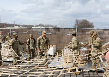 101st HHBn Soldiers palletize EDRE supplies