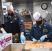 USS Momsen Sailors Serve Food