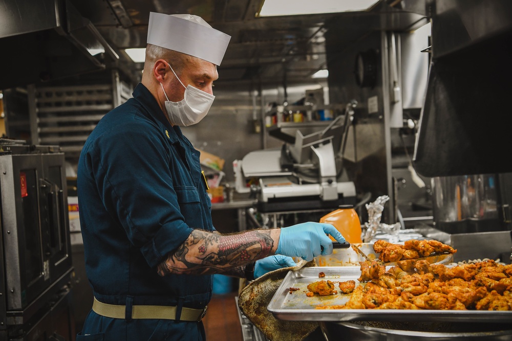 USS Momsen Sailors Serve Food