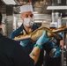 USS Momsen Sailors Serve Food