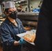USS Momsen Sailors Serve Food
