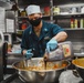 USS Momsen Sailors Serve Food